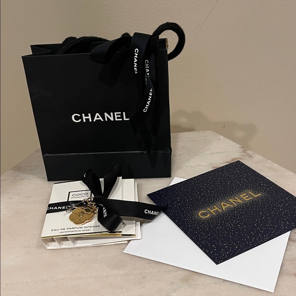 CHANEL Camellia Gold Holiday 2025 Charm With Silver Comet Accent
